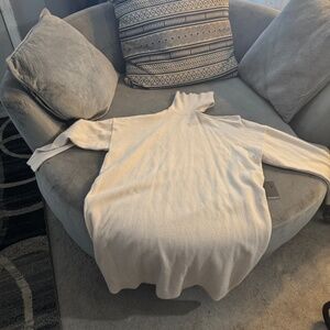 Cream sweater dress with neck cut out